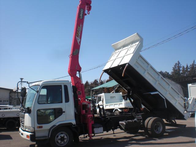 12-1999 NISSAN CONDOR DUMP UNIC CRANE TRUCK