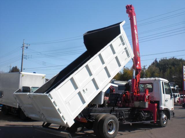 12-1999 NISSAN CONDOR DUMP UNIC CRANE TRUCK