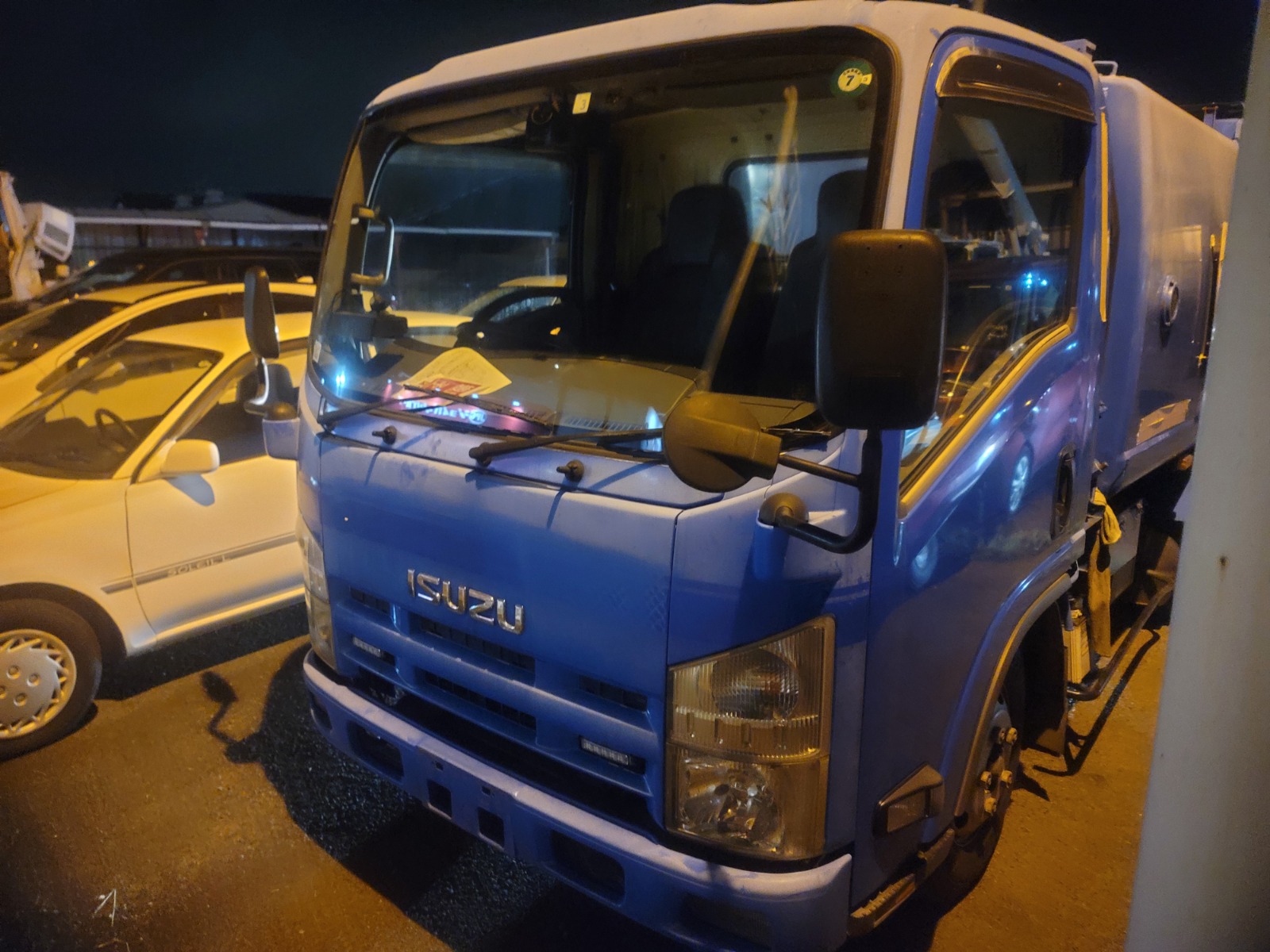 DEC 2011 ISUZU ELF GARBAGE TRUCK