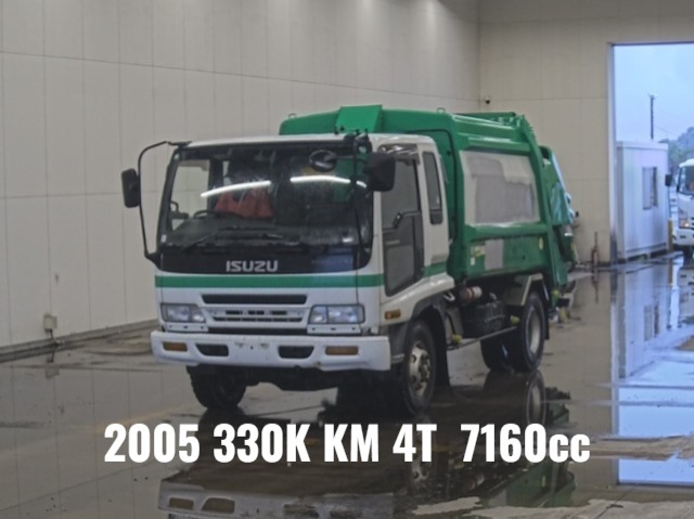 2005 ISUZU FORWARD GARBAGE TRUCK.